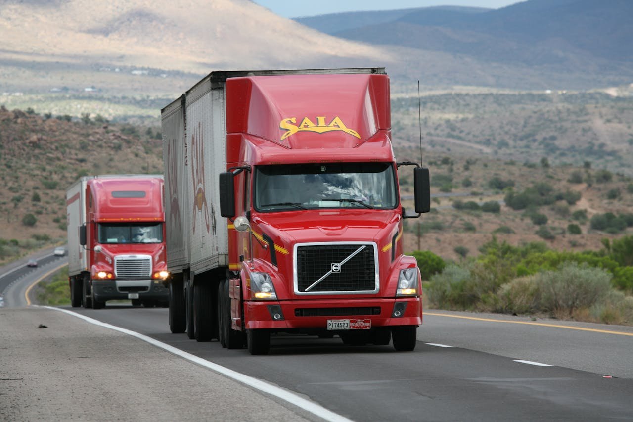 Semi trucks on a US highway — trucking freight rates 2026